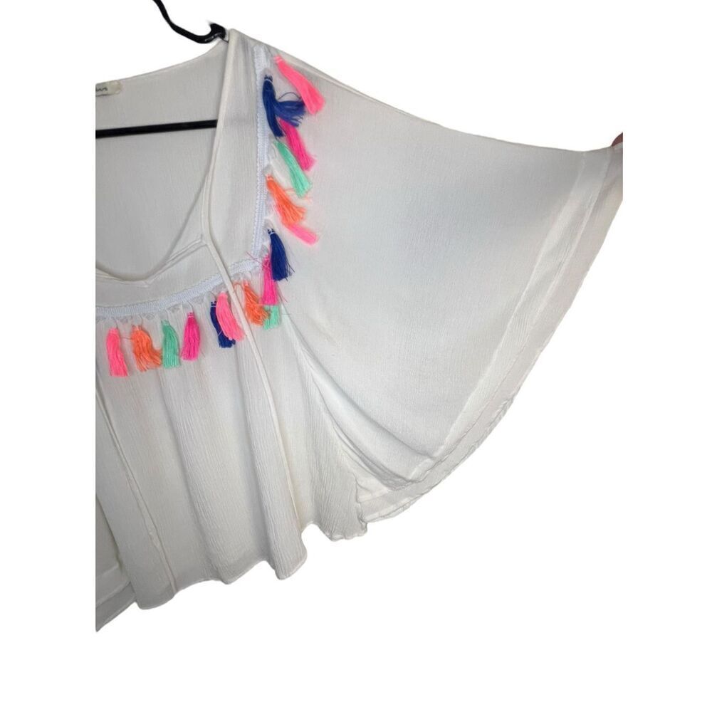 Blushing Heart Boho White Poncho Style Blouse With Colorful Tassels - Picture 4 of 5